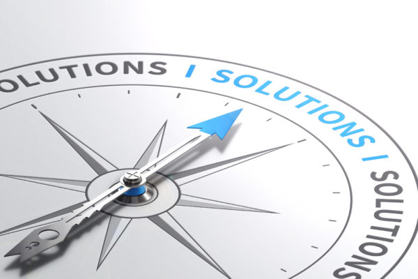 Graphic of compass pointing to solutions text
